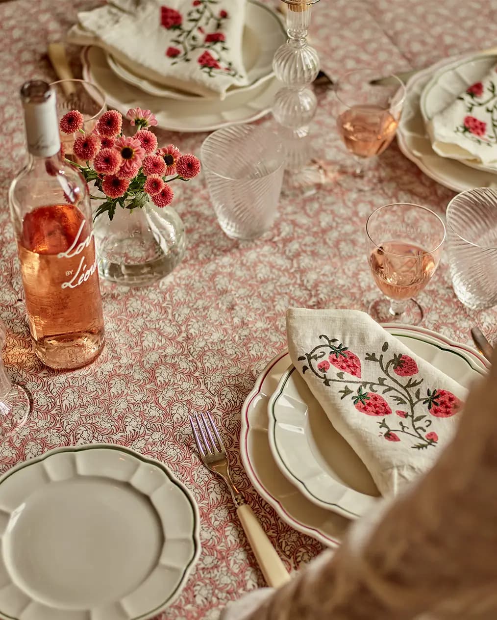 Luxurious pink table setting featuring a variety of wine glasses from The Wedding Present Company.