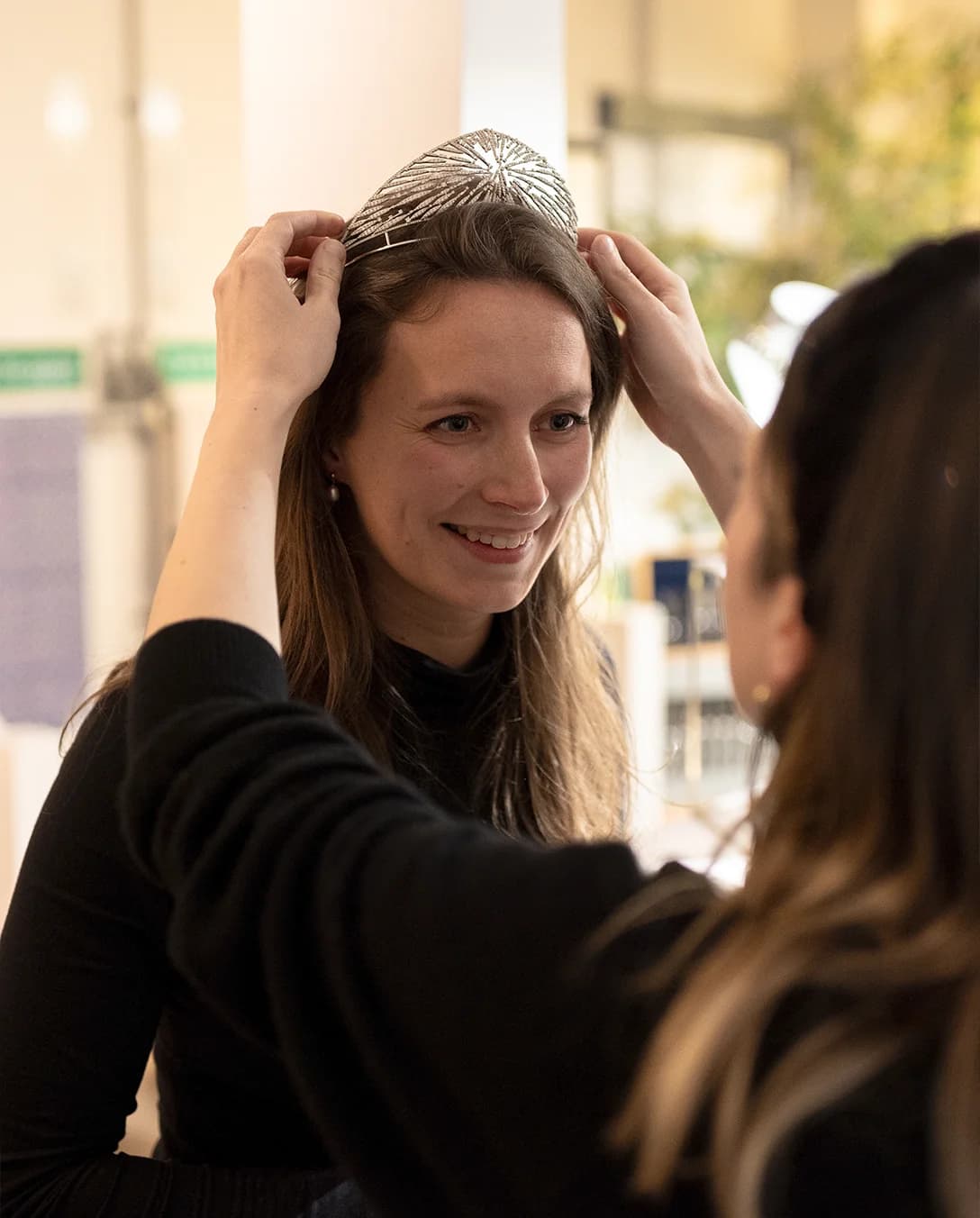 The Wedding Present Company bride tries on a tiara