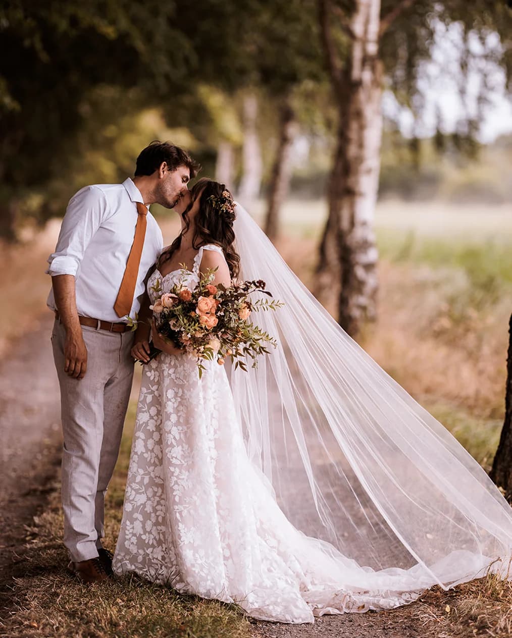 bride and groom sharing a romantic kiss 