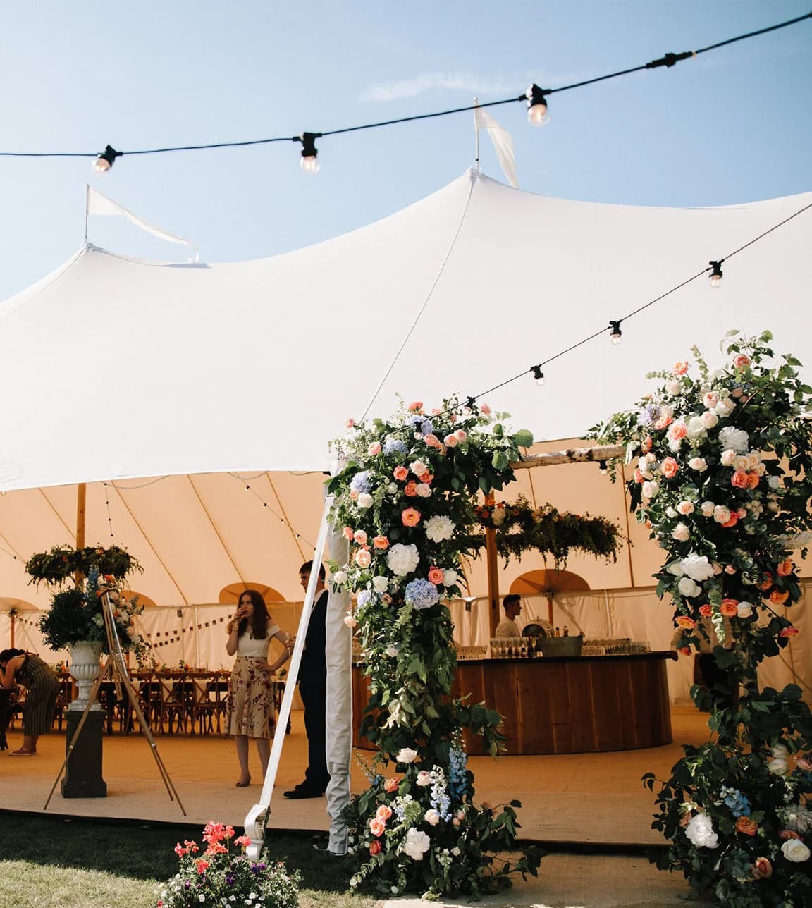 Wedding marquee with floral arch
