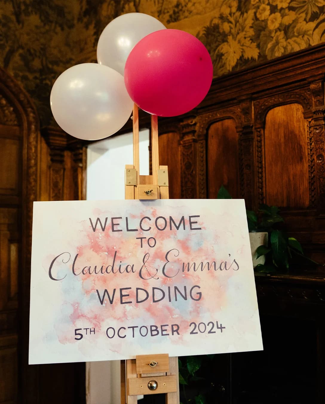 Wedding sign with pink and white balloons