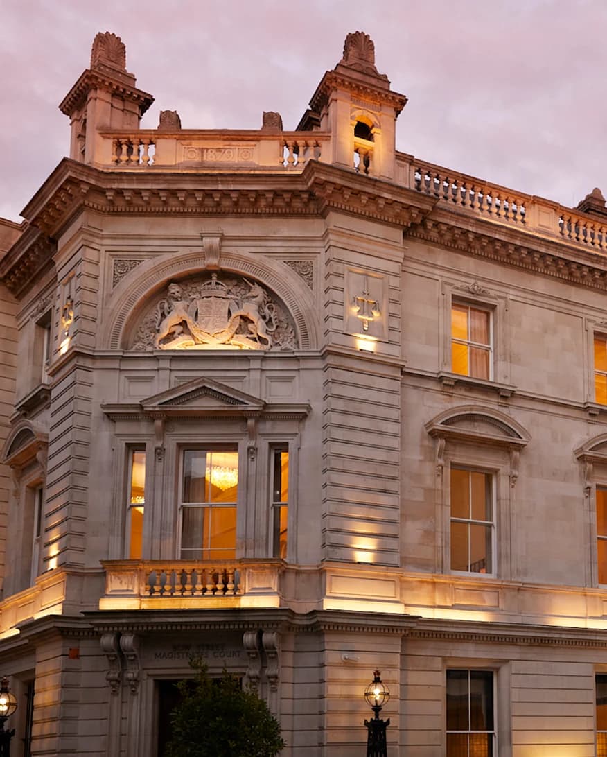NoMad London wedding venue exterior with grand historic architecture and elegant stone façade at dusk