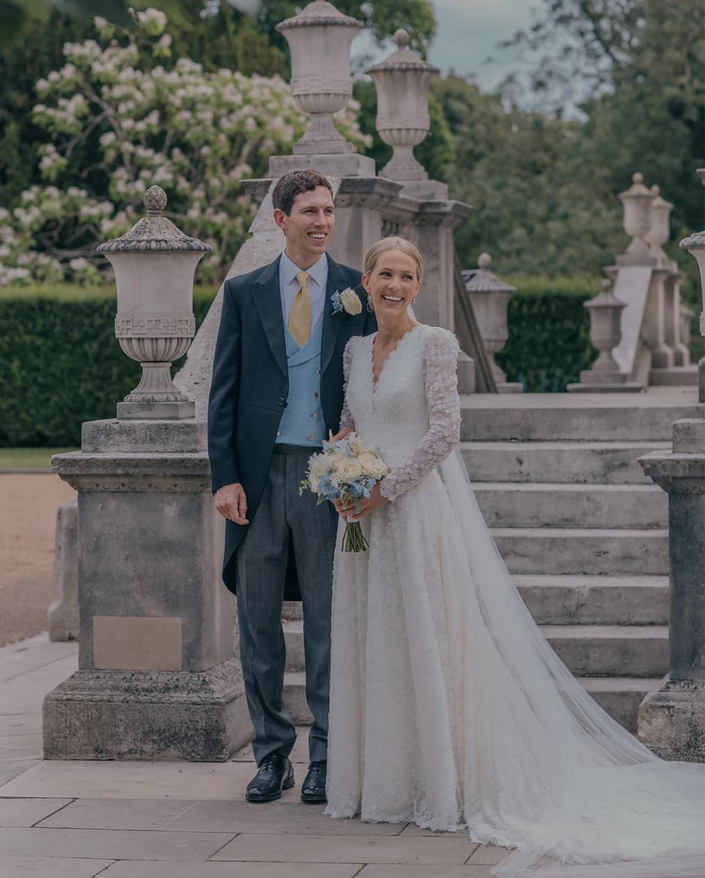 Chiswick House and Gardens wedding London with bride in lace dress and groom wearing morning suit against historic garden backdrop
