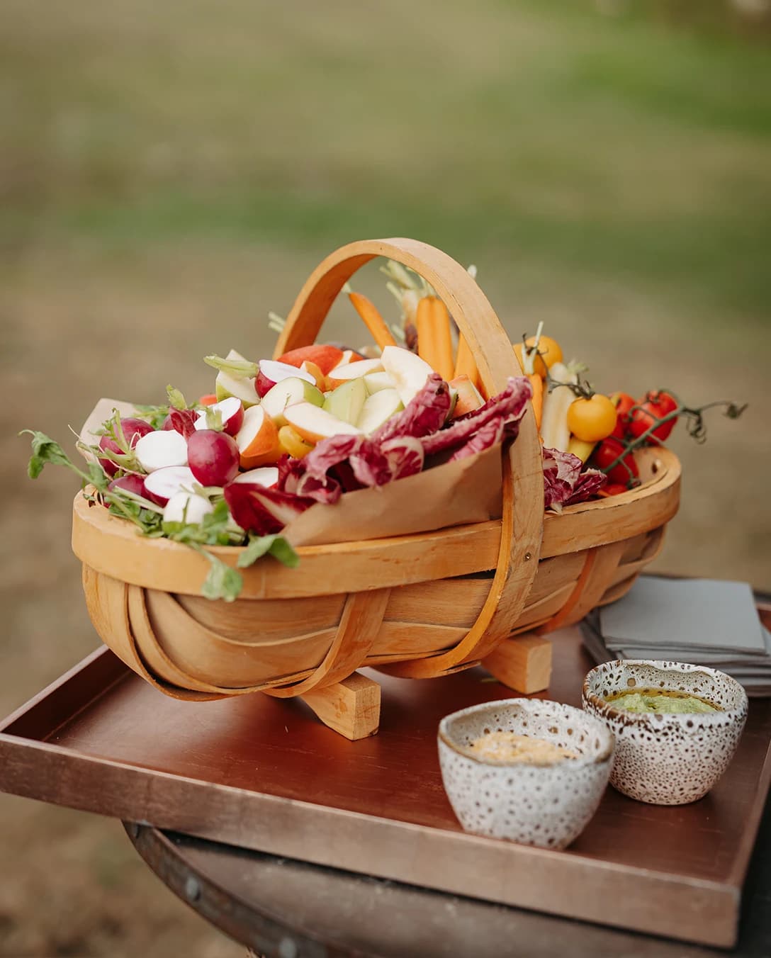 Artisan wedding canapé station featuring fresh seasonal crudités, colourful vegetables and dipping sauces