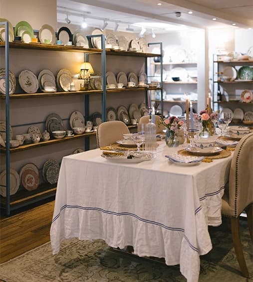 A beautiful tablescape and tableware display in The Wedding Present Company showroom