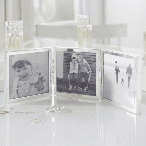 Image showing the Triple Aperture Hinged Photograph Frame, fine silver product.
